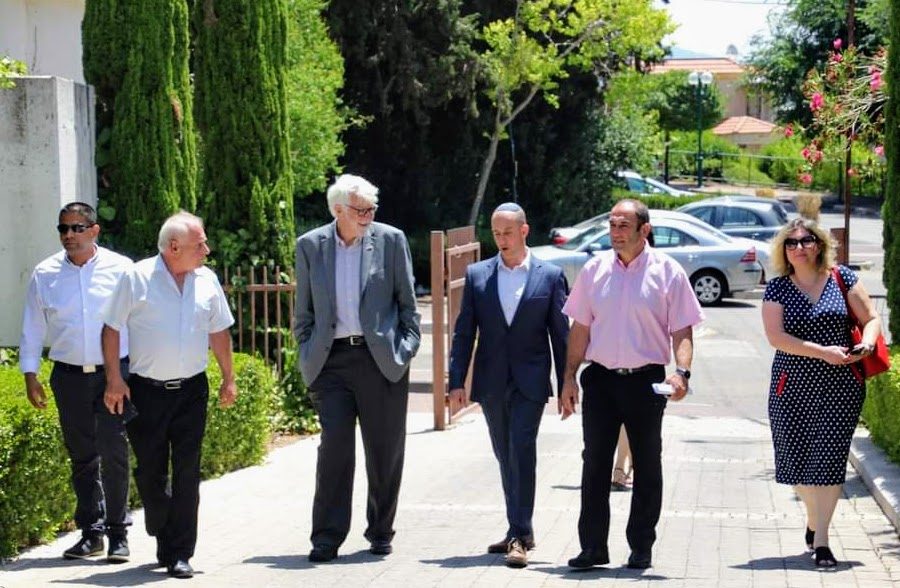 Tal Paperin with a US embassy delegation and ambassador