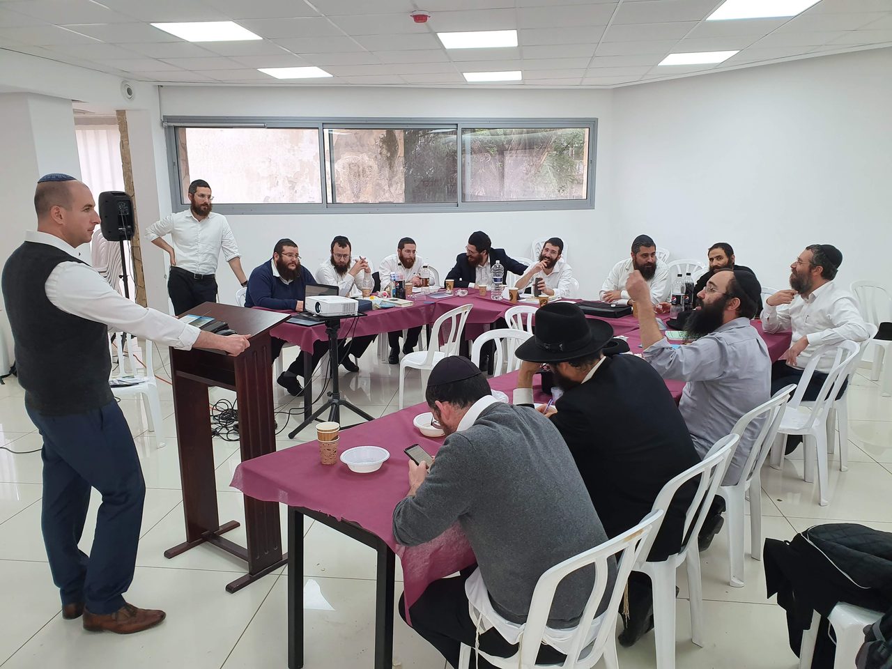 Tal Paperin training a sales team